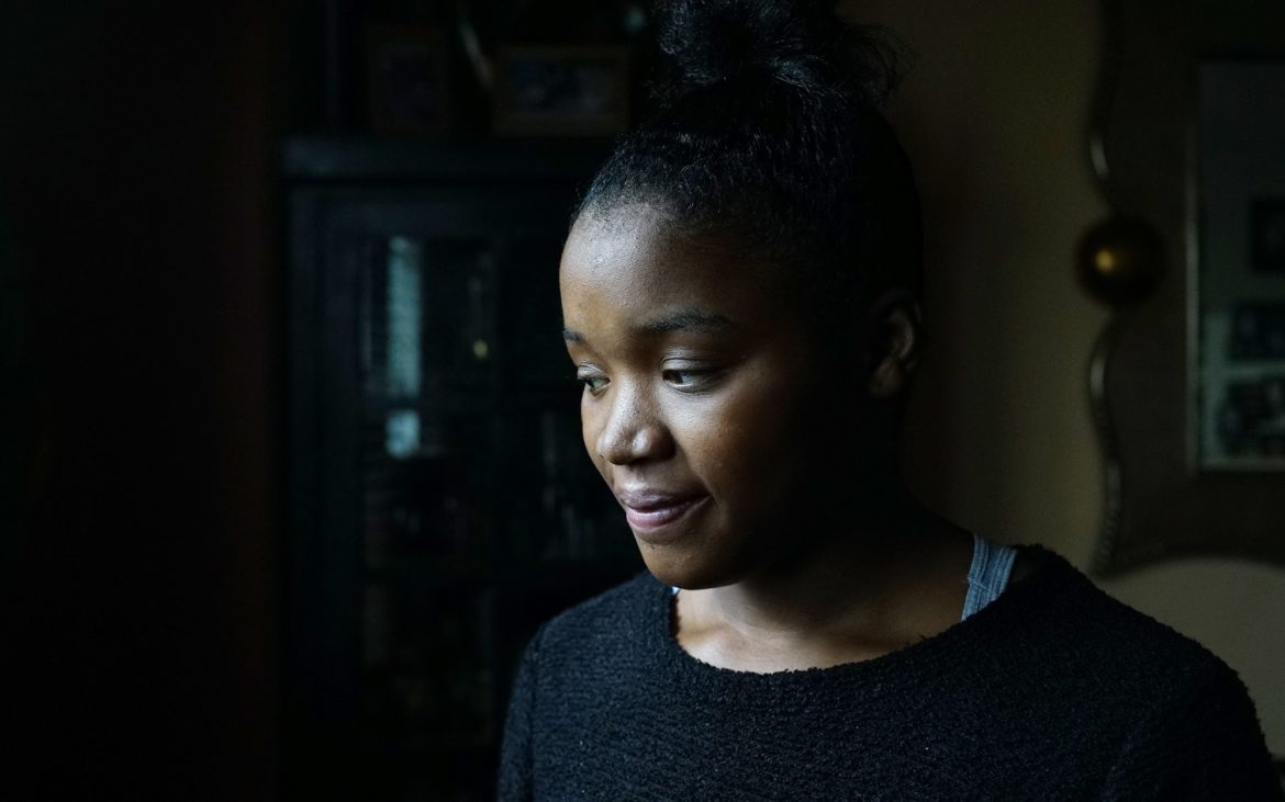 Tyneisha Wilder lives with her foster mother in Wilkinsburg. The 18-year-old has supervised visits with her son twice a month. (Photo by Ryan Loew/PublicSource)